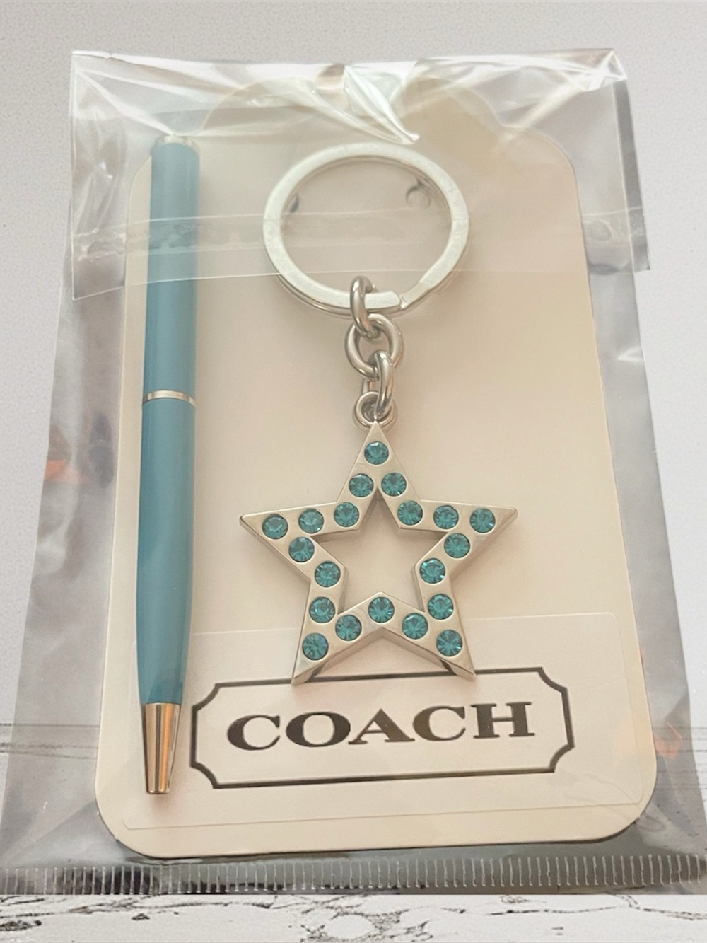 Coach Blue Pave Crystal Star Keychain Fob. Vintage set with matching pen. NWT